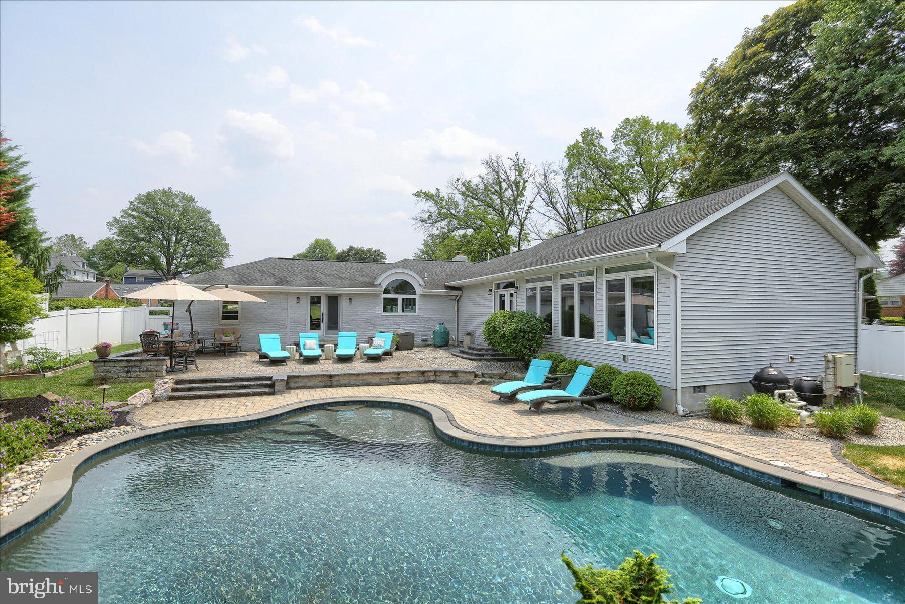 503 Maple Avenue Hershey, PA 17033 - Photo 35 of 43 a front view of a house with swimming pool and furniture