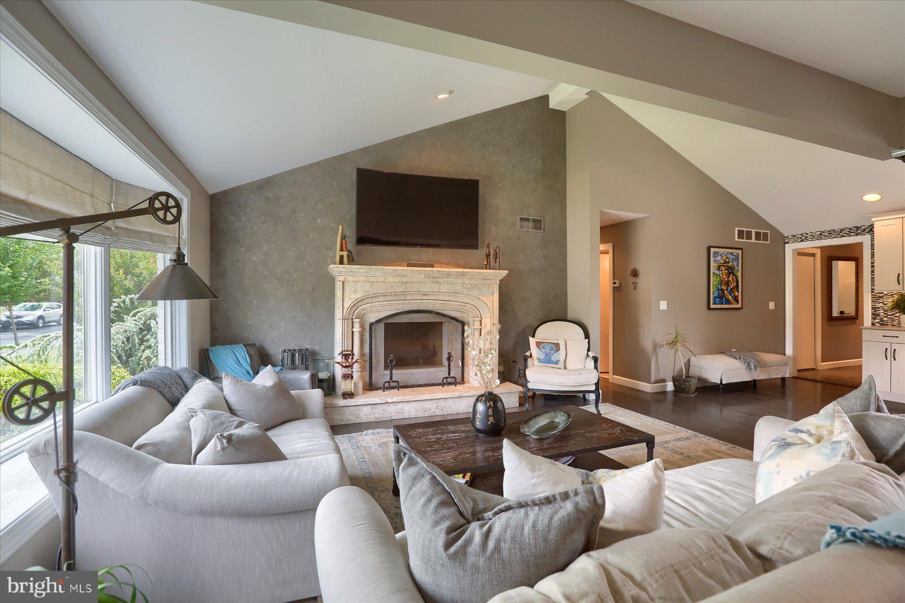 503 Maple Avenue Hershey, PA 17033 - Photo 5 of 43 a living room with furniture a fireplace and a large window