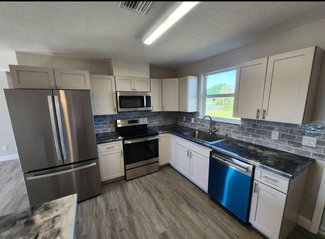 1249 Chobee Street Okeechobee, FL 34974 - Photo 3 of 8 640883843088200983