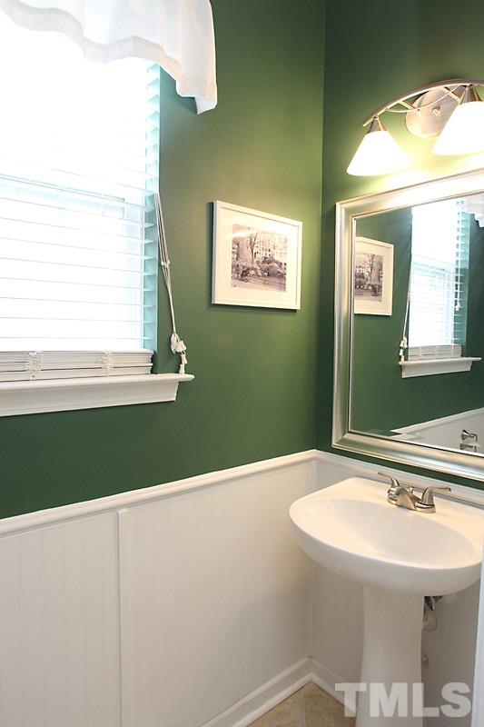 4717 Delta Ridge Court Raleigh, NC 27612 - Photo 11 of 25 Tile floor and beadboard