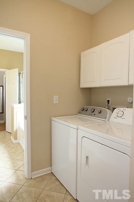 4717 Delta Ridge Court Raleigh, NC 27612 - Photo 12 of 25 Direct access to laundry from Master Bath, so convenient.