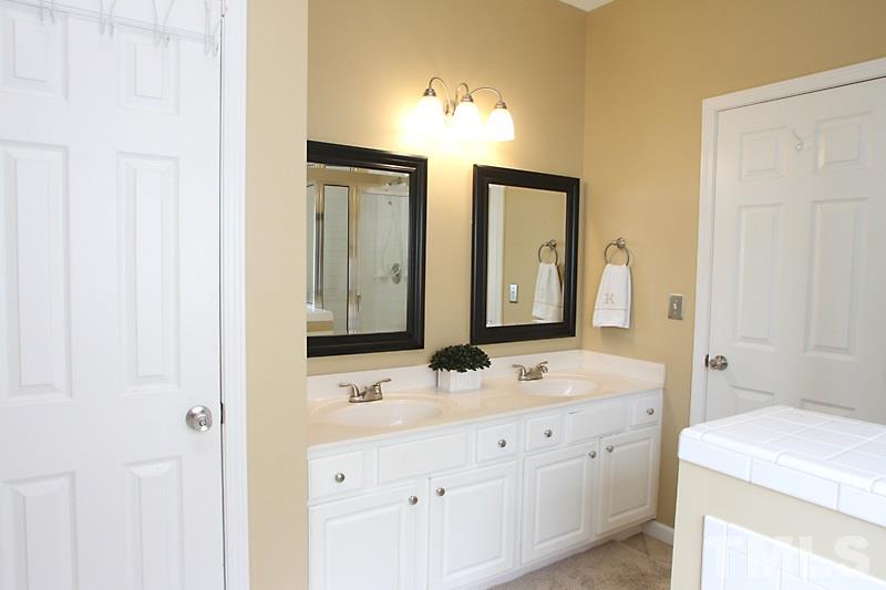 4717 Delta Ridge Court Raleigh, NC 27612 - Photo 15 of 25 Double sinks with separate water closet.