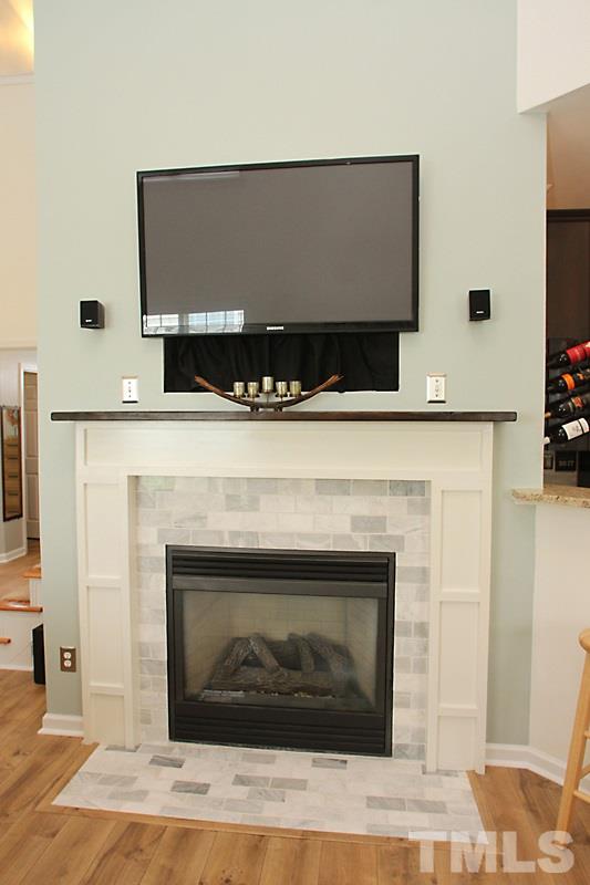 4717 Delta Ridge Court Raleigh, NC 27612 - Photo 8 of 25 Wonderful custom surround and mantle