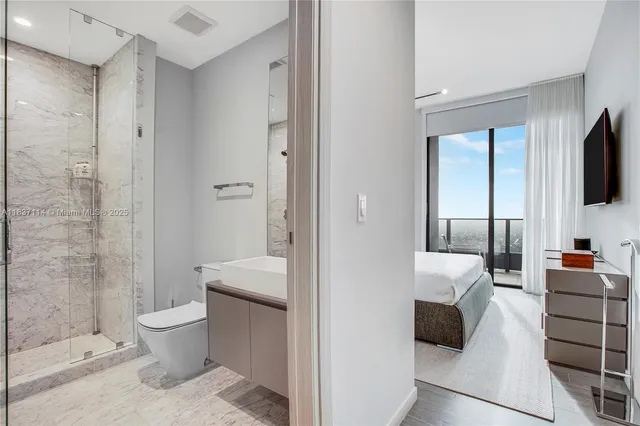 a bathroom with a toilet a sink and a bathtub