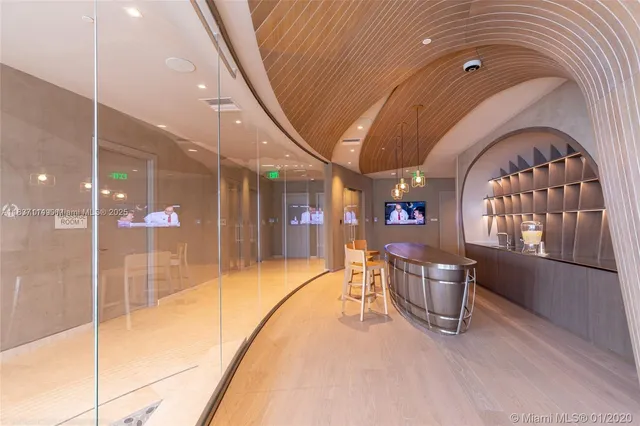 a lobby with furniture and window