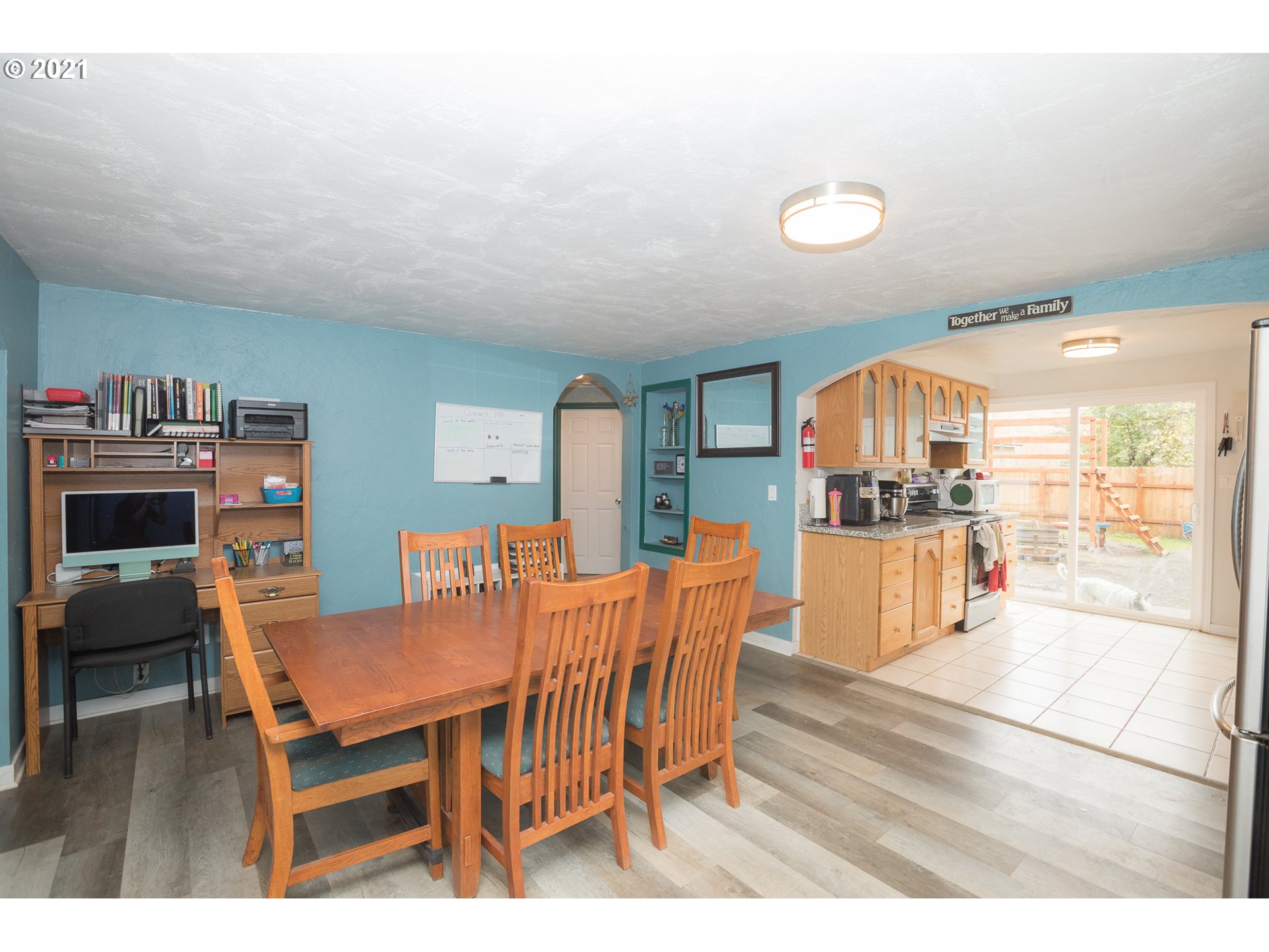 415 36th Street Springfield, OR 97478 - Photo 4 of 27 a dining room with a table and chairs