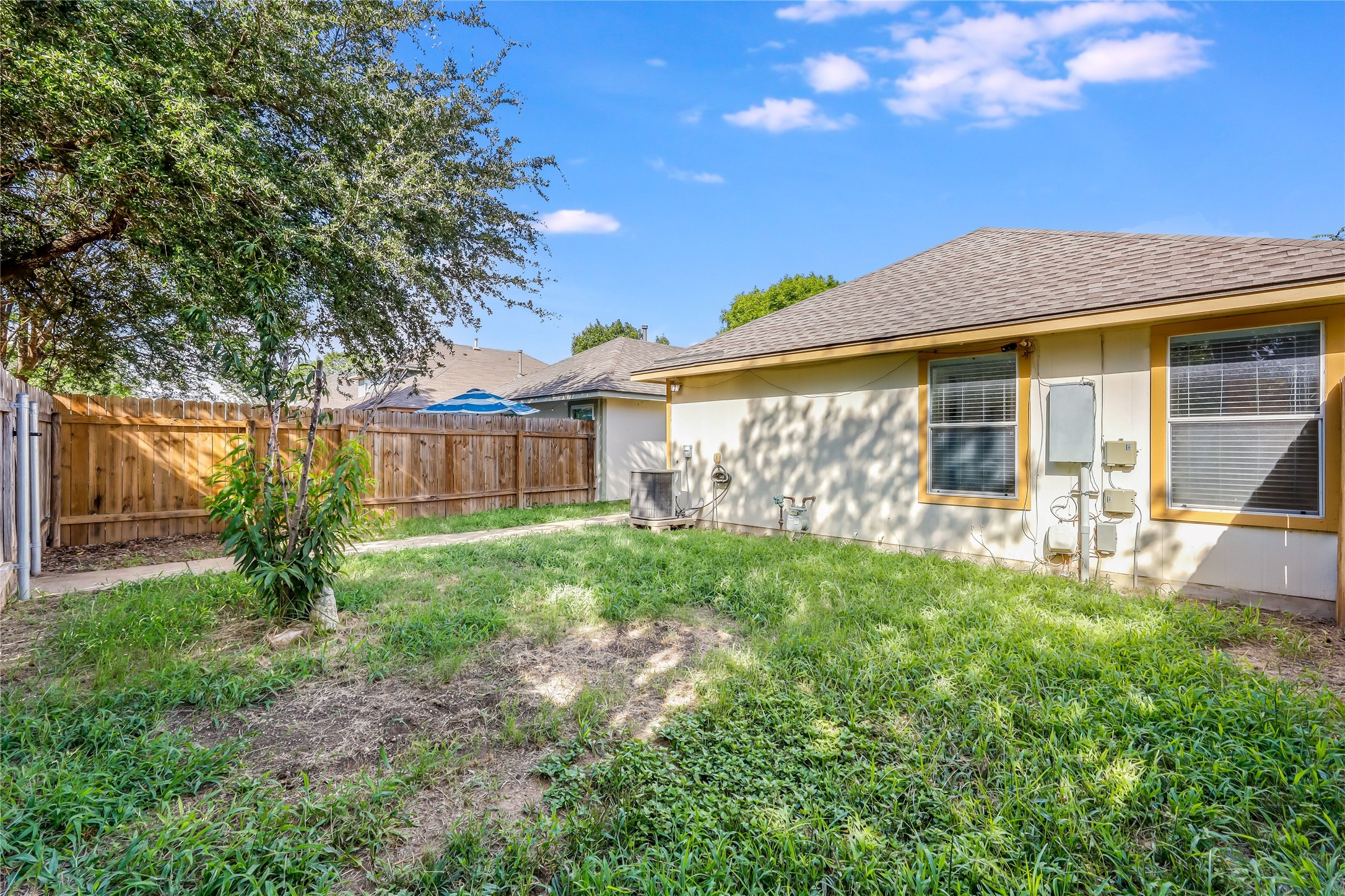 4510 Secure Lane Austin, TX 78725 - Photo 22 of 24 a front view of a house with garden