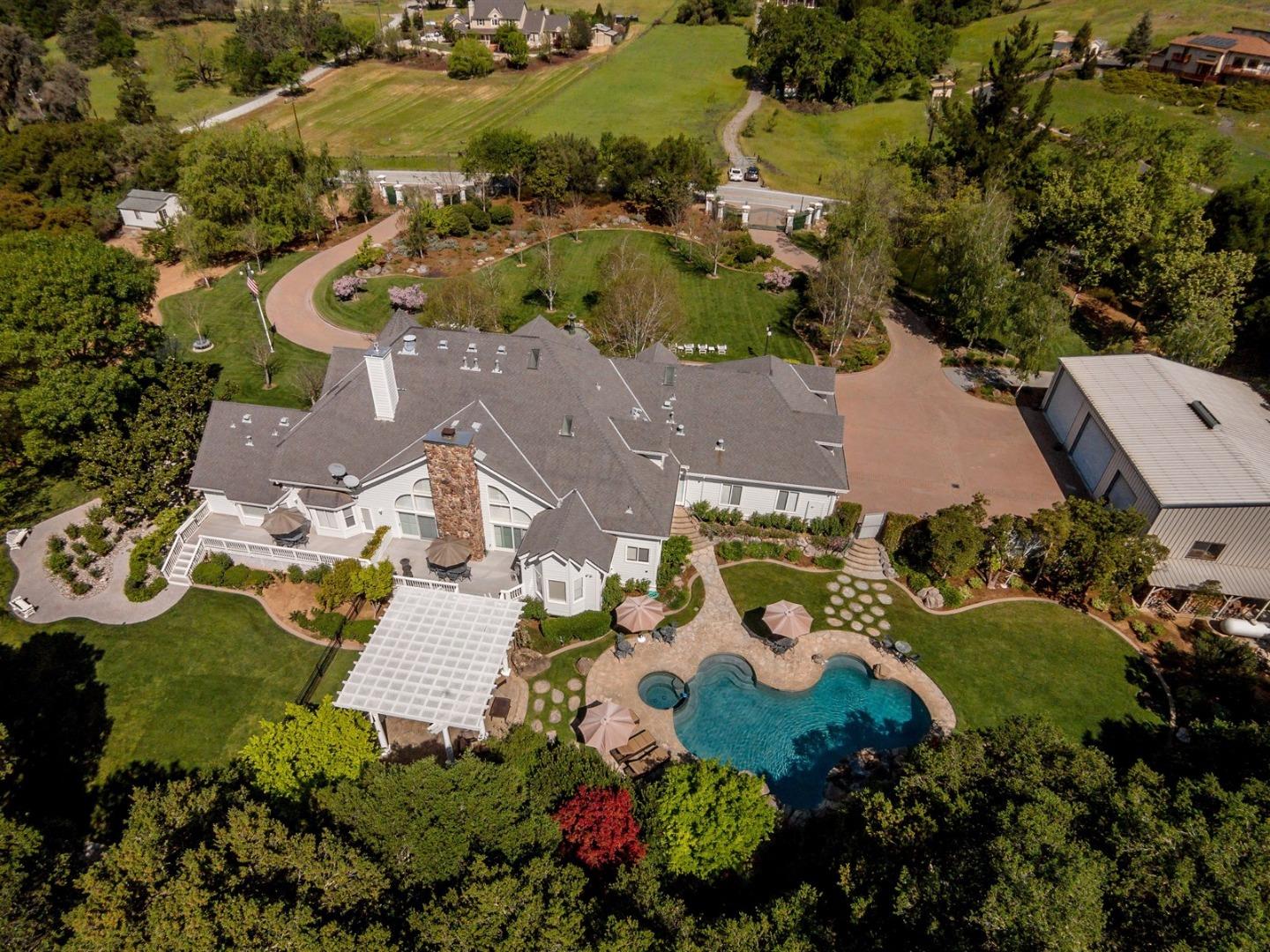 an aerial view of residential house with outdoor space