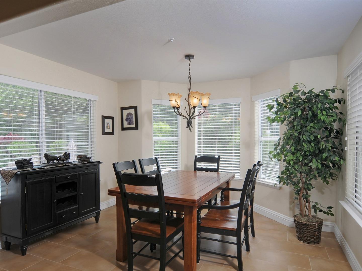 10035 Burchell Road Gilroy, CA 95020 - Photo 18 of 55 a view of a dining room with furniture and window