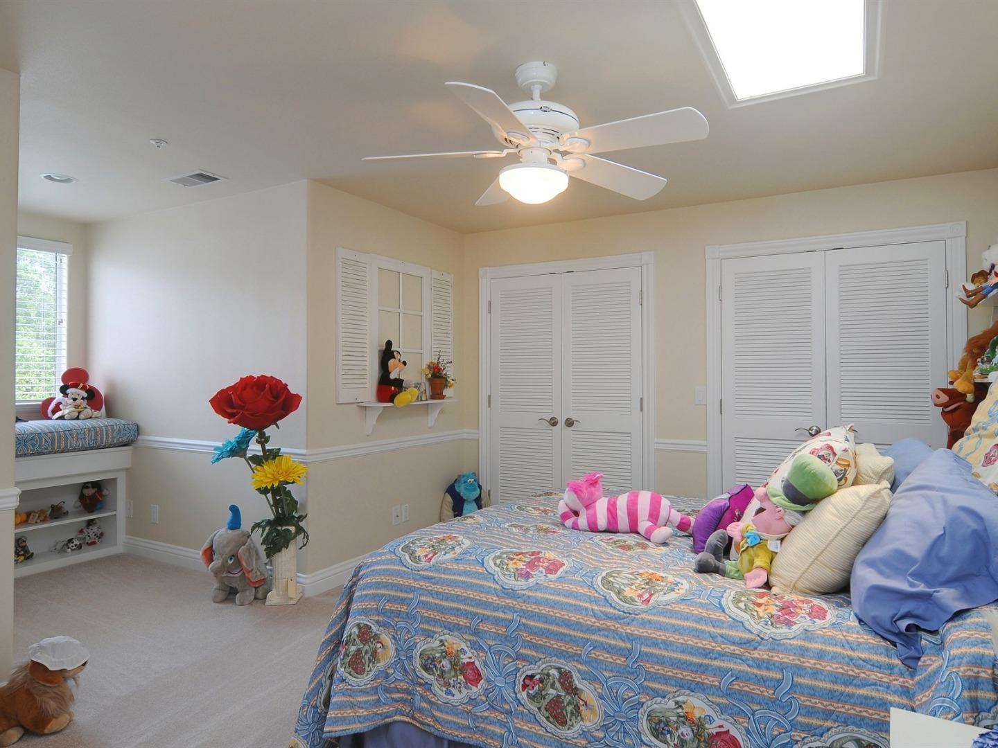 10035 Burchell Road Gilroy, CA 95020 - Photo 26 of 55 a bedroom with a bed and hallway