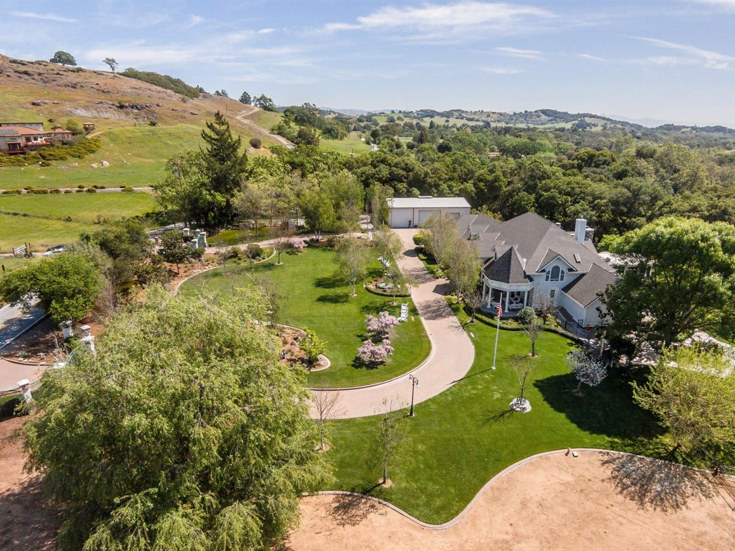10035 Burchell Road Gilroy, CA 95020 - Photo 5 of 55 an aerial view of residential houses with outdoor space and trees