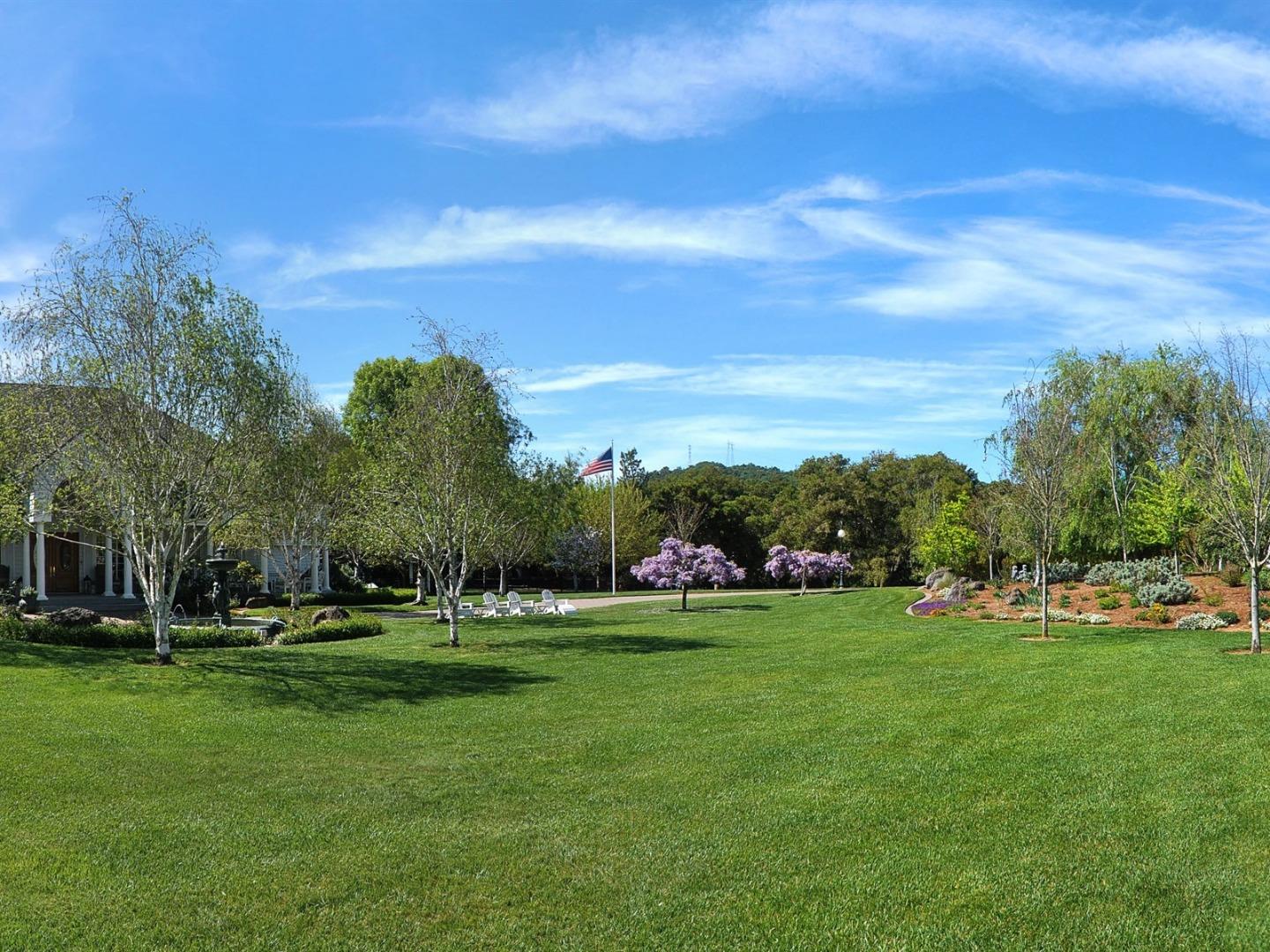 10035 Burchell Road Gilroy, CA 95020 - Photo 6 of 55 a view of grassy field with benches and trees