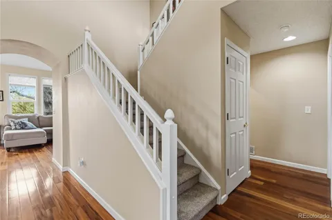 a view of livingroom with furniture and stairs
