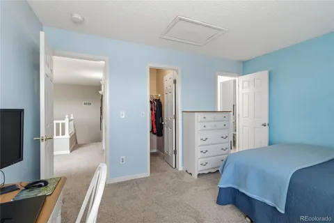 a living room with fireplace furniture and a flat screen tv