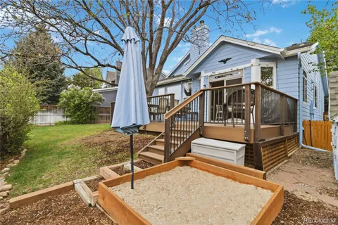 an aerial view of a house with outdoor space