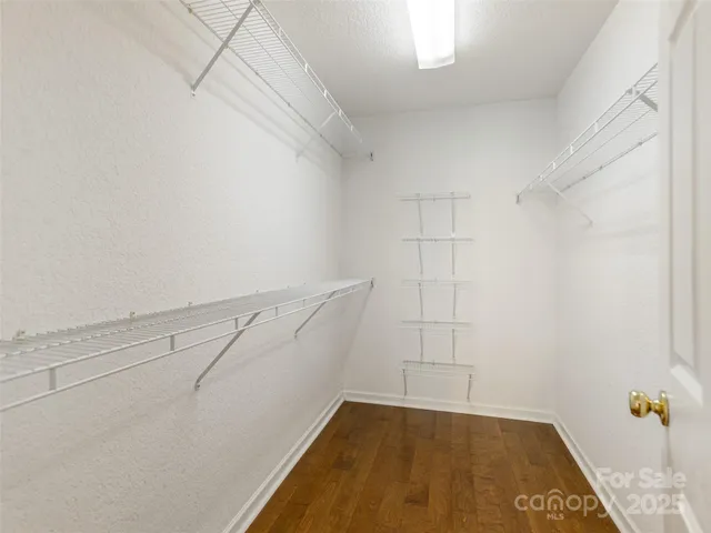 a view of a room with racks on the wall