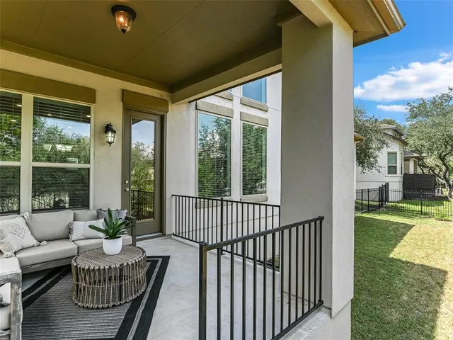a view of a porch with furniture