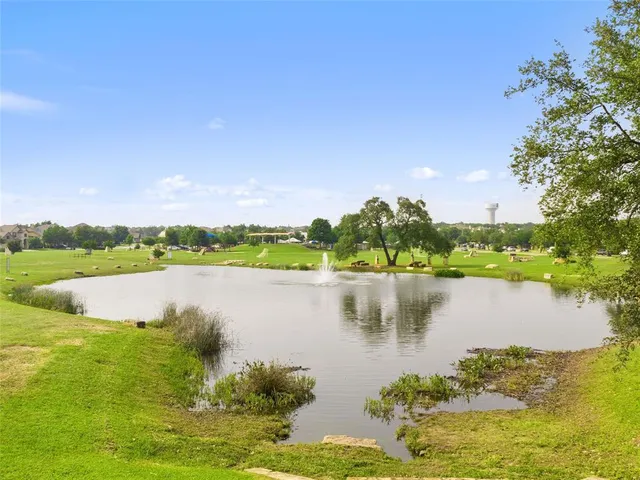 a view of a lake with a city view