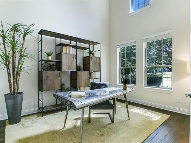 a view of a workspace with furniture