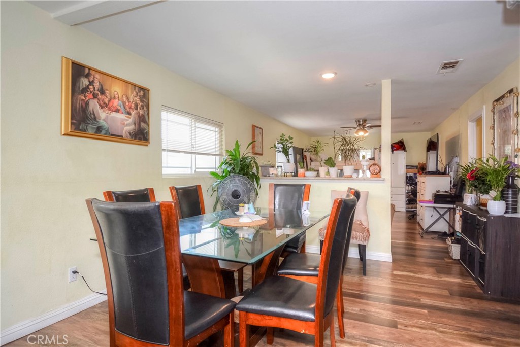 4320 Ambs Drive Riverside, CA 92505 - Photo 19 of 35 a dining room with furniture and wooden floor