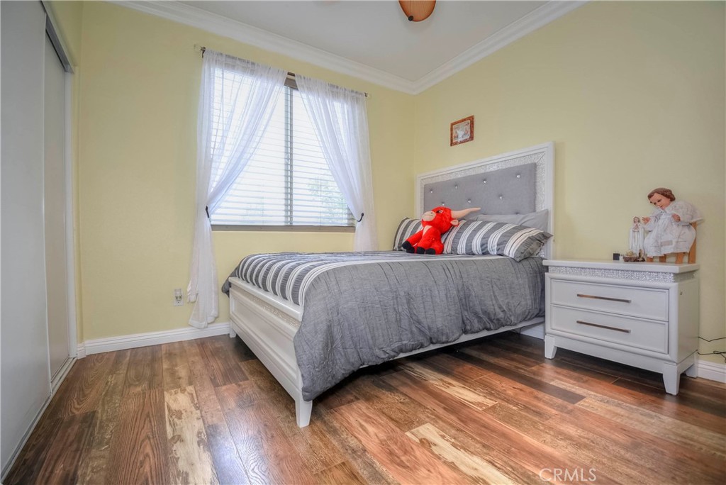 4320 Ambs Drive Riverside, CA 92505 - Photo 34 of 35 a bedroom with a bed and a window