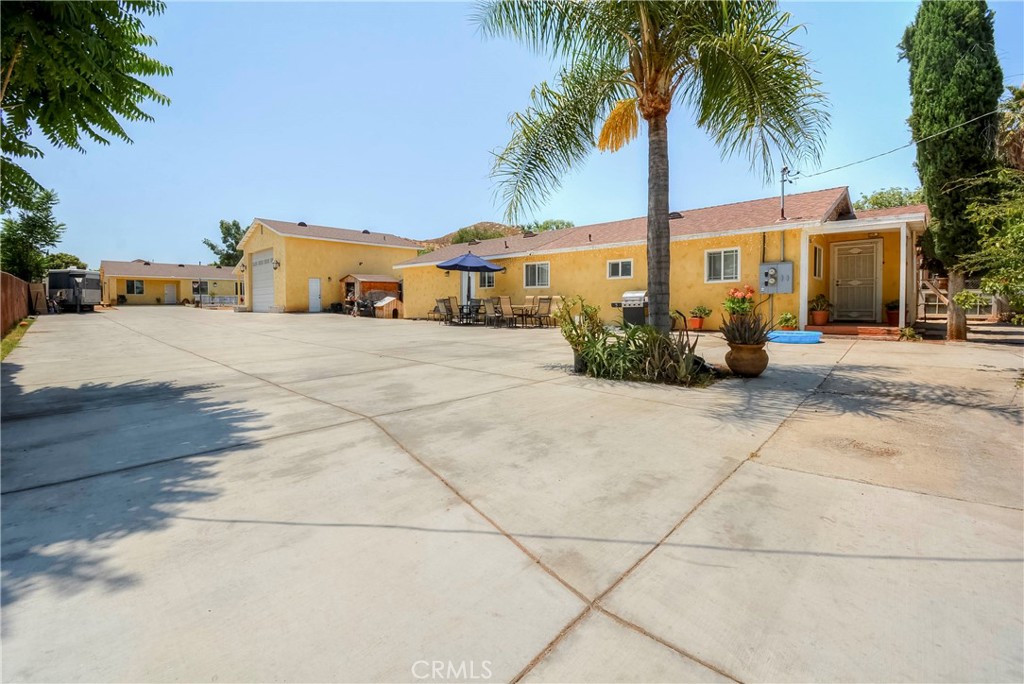 4320 Ambs Drive Riverside, CA 92505 - Photo 6 of 35 a front view of multiple houses with yard