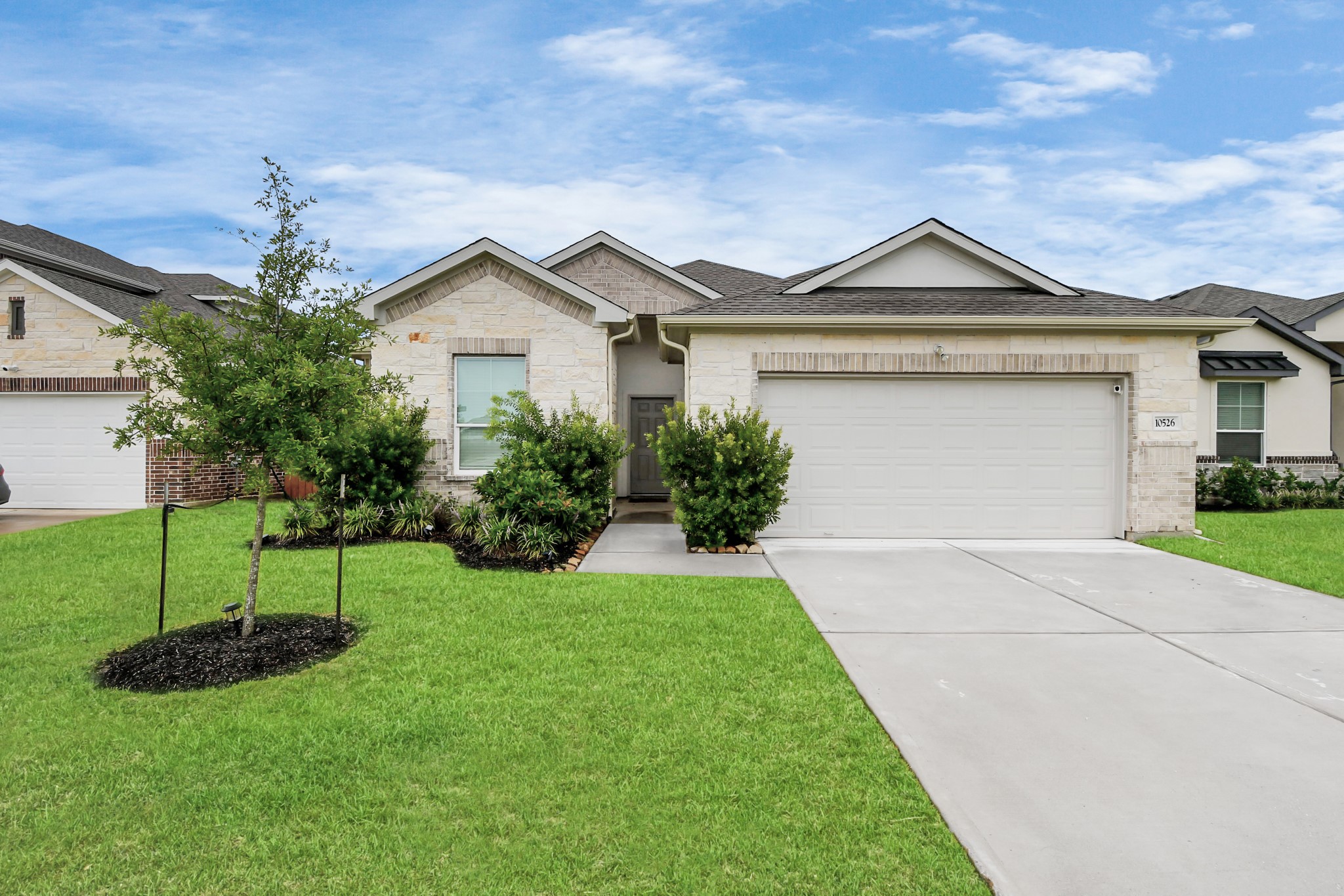 Large one story cottage with 4 bedrooms and a large yard.