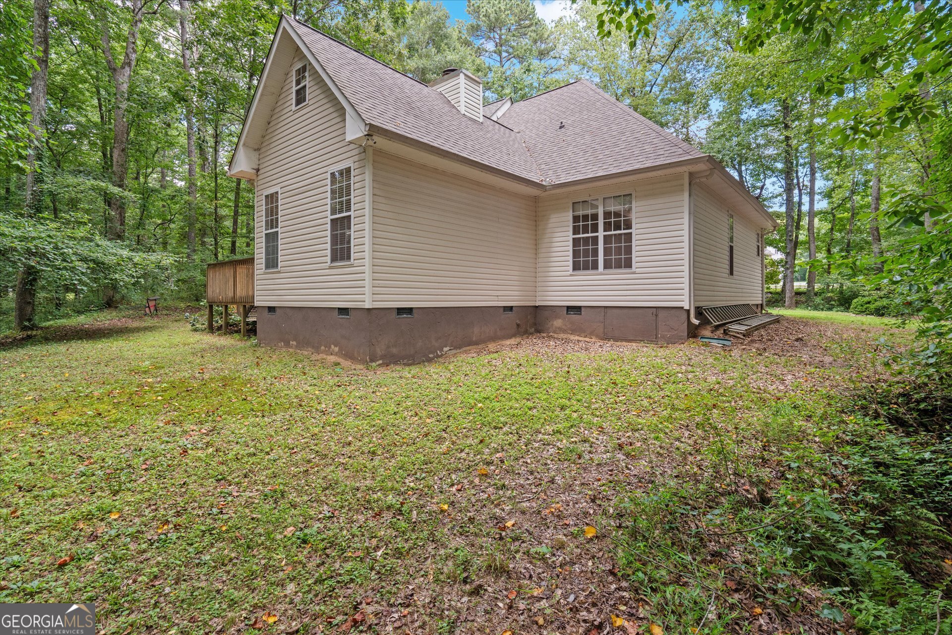 1217 Monticello Drive Villa Rica, GA 30180 - Photo 23 of 36 a house view with a garden space