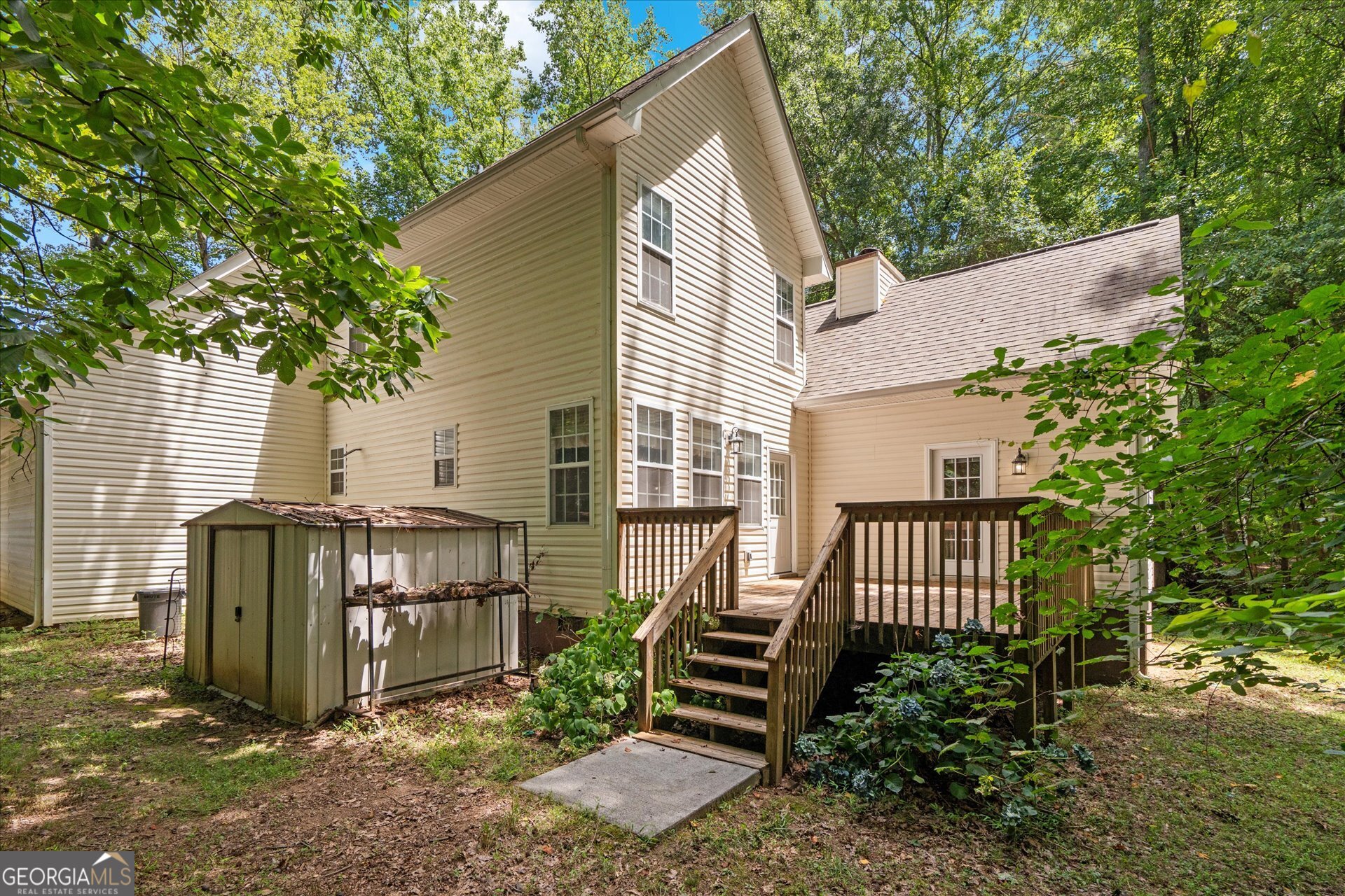 1217 Monticello Drive Villa Rica, GA 30180 - Photo 24 of 36 a front view of a house with garden