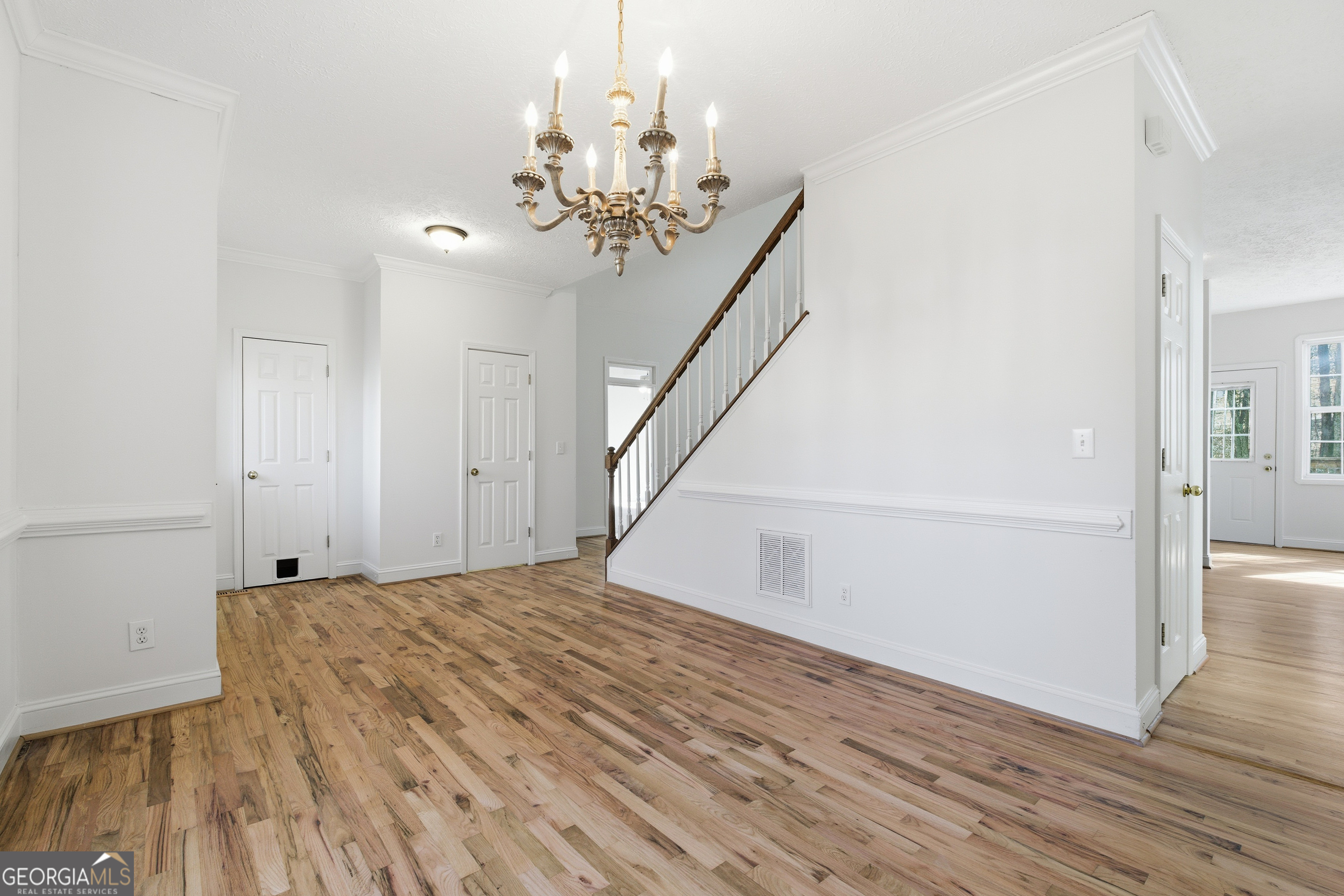 1217 Monticello Drive Villa Rica, GA 30180 - Photo 5 of 36 a view of a livingroom with wooden floor