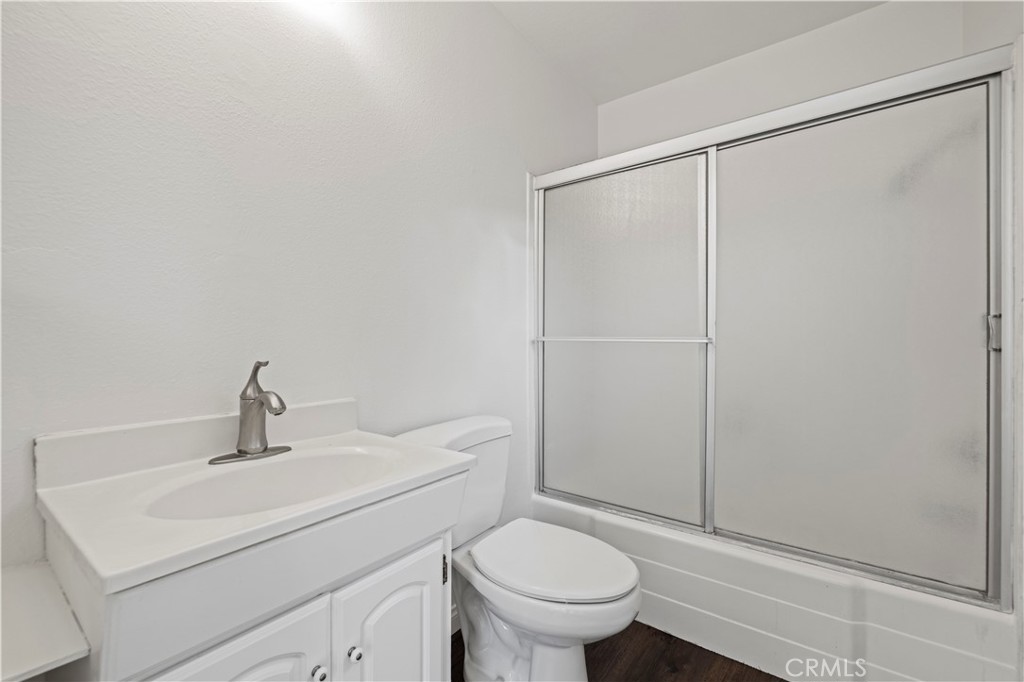 28014 Fox Run Circle Castaic, CA 91384 - Photo 17 of 27 a bathroom with a sink a toilet and shower