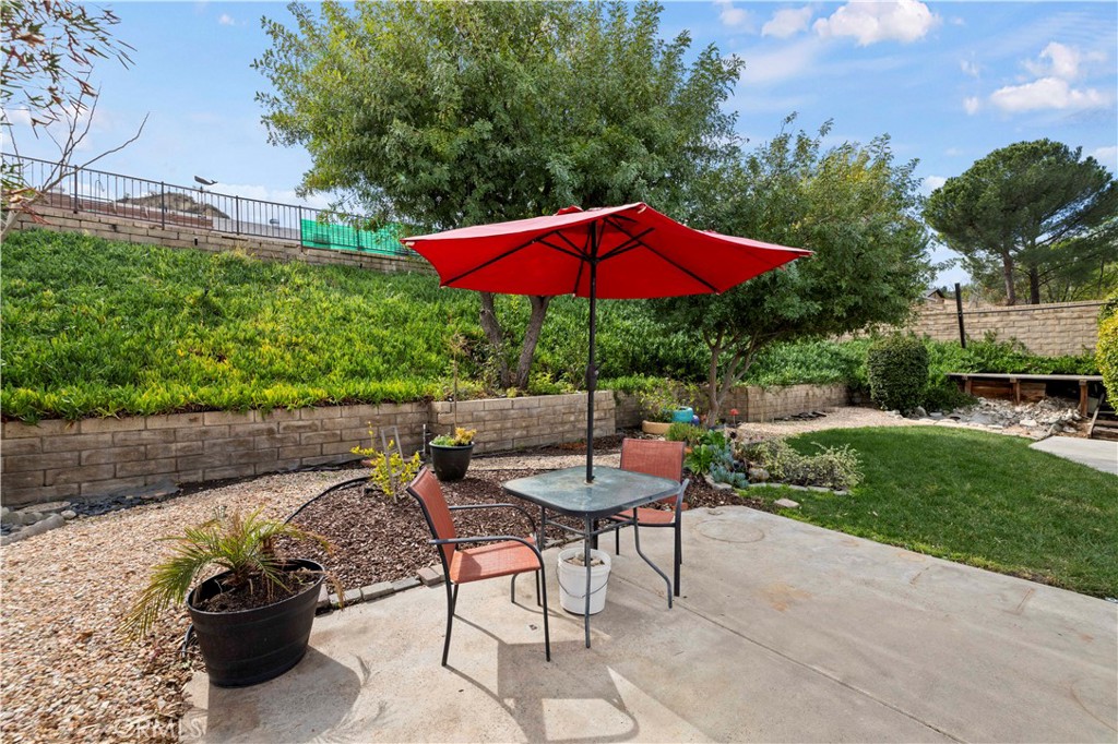 28014 Fox Run Circle Castaic, CA 91384 - Photo 18 of 27 a view of a backyard with sitting area and furniture