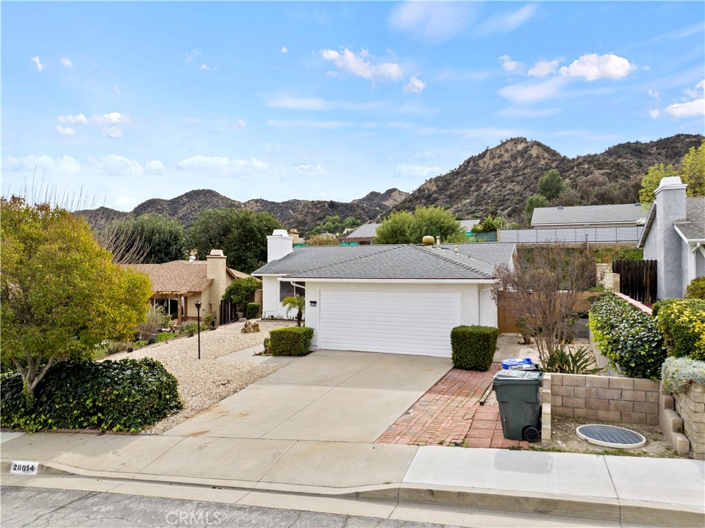 28014 Fox Run Circle Castaic, CA 91384 - Photo 22 of 27 a view of a terrace with a garden and mountain view