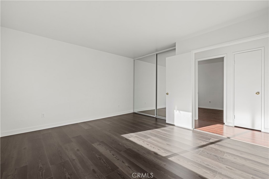 28014 Fox Run Circle Castaic, CA 91384 - Photo 10 of 27 an empty room with wooden floor