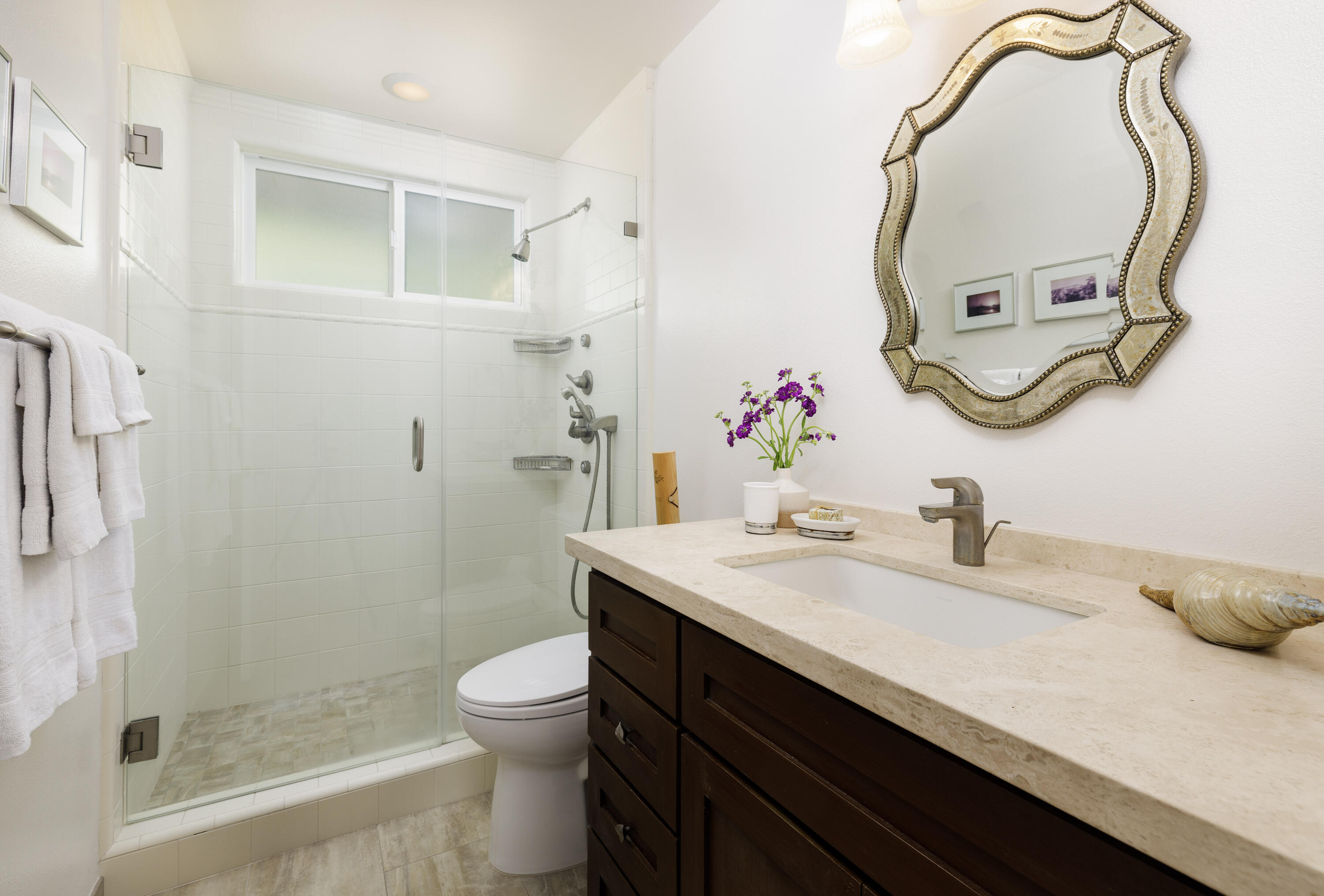 425 Fellowship Road Santa Barbara, CA 93109 - Photo 12 of 20 a bathroom with a sink and a mirror