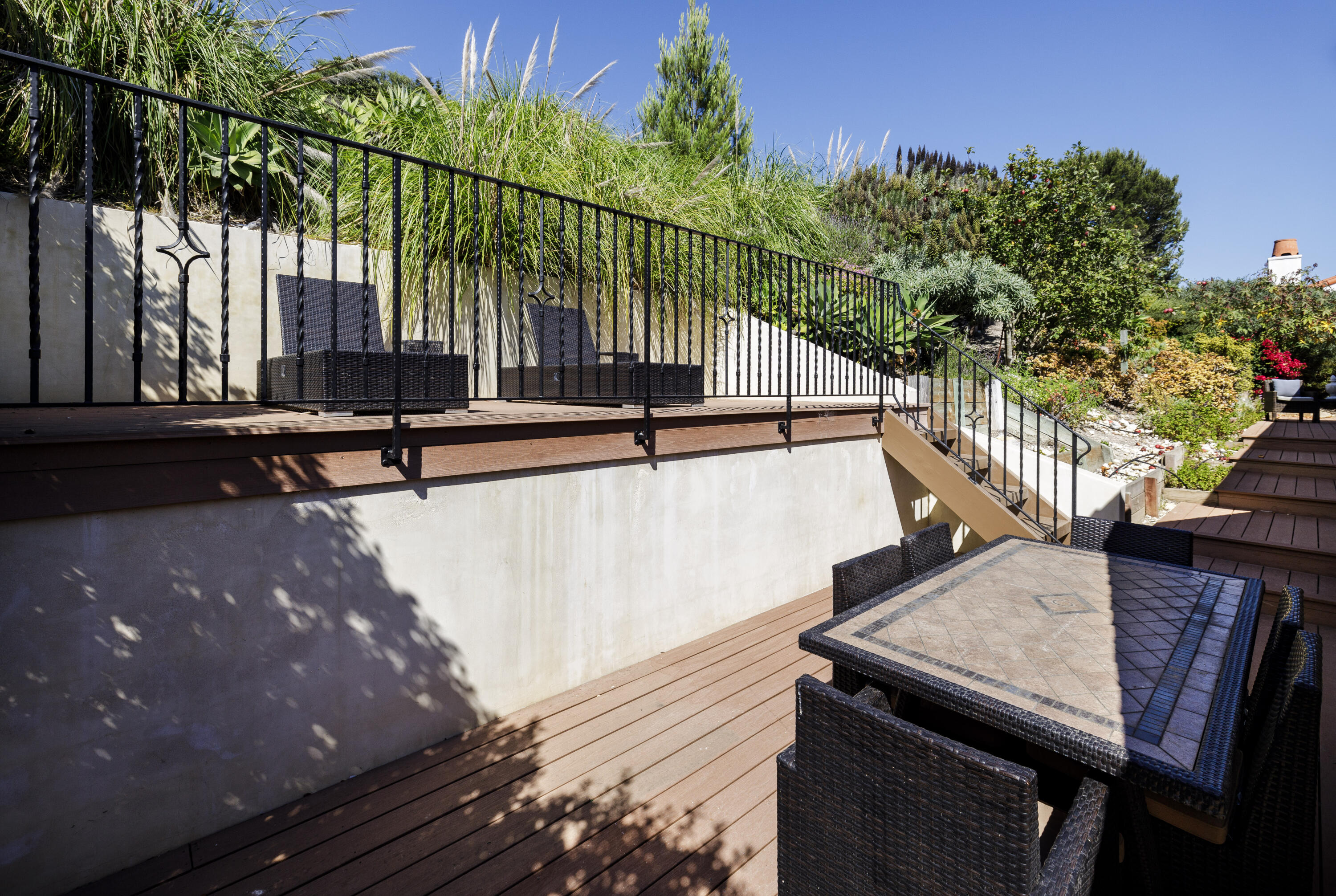 425 Fellowship Road Santa Barbara, CA 93109 - Photo 16 of 20 a view of backyard with roof deck and wooden stairs