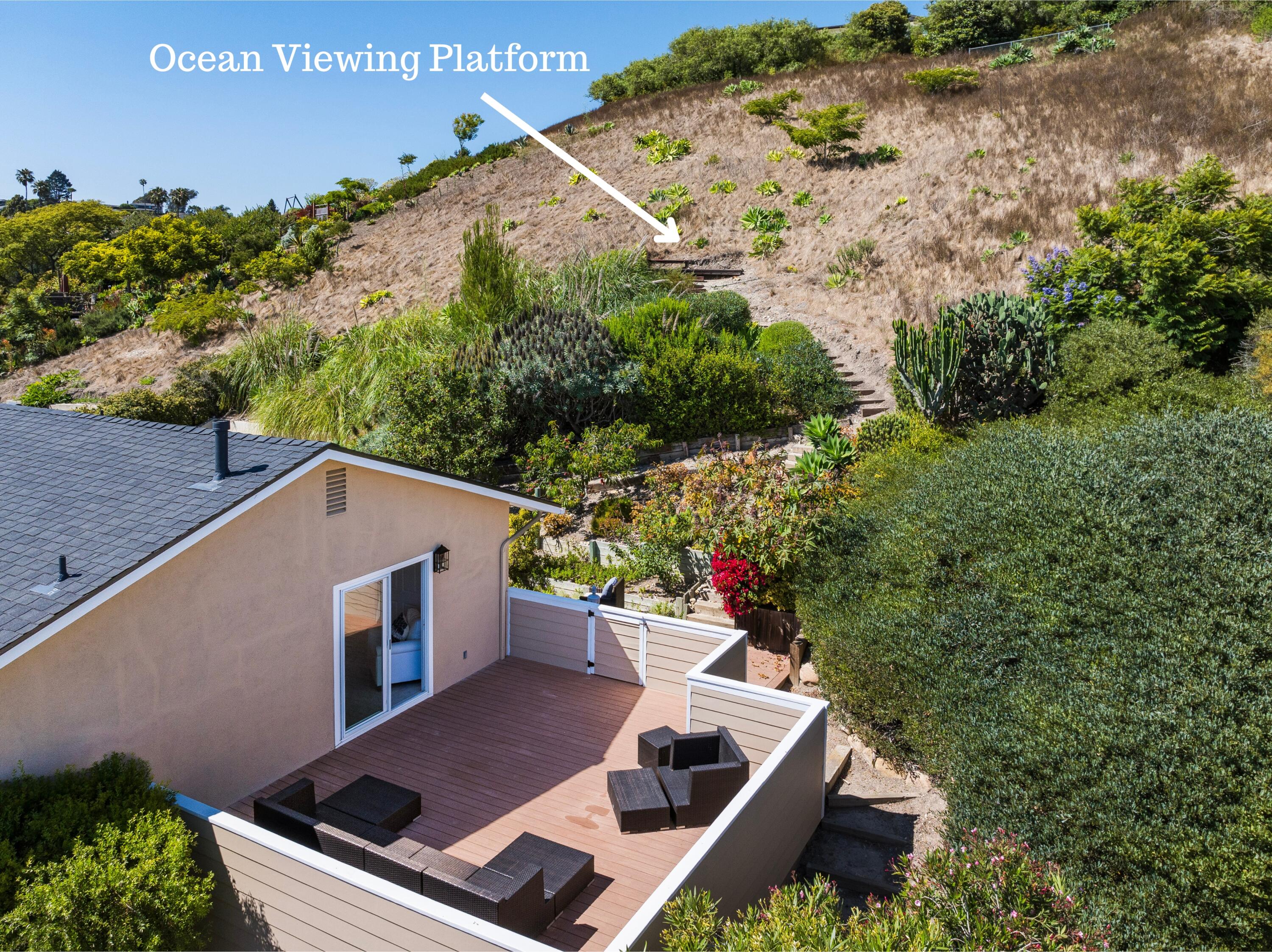 425 Fellowship Road Santa Barbara, CA 93109 - Photo 18 of 20 a view of a backyard with plants and a patio