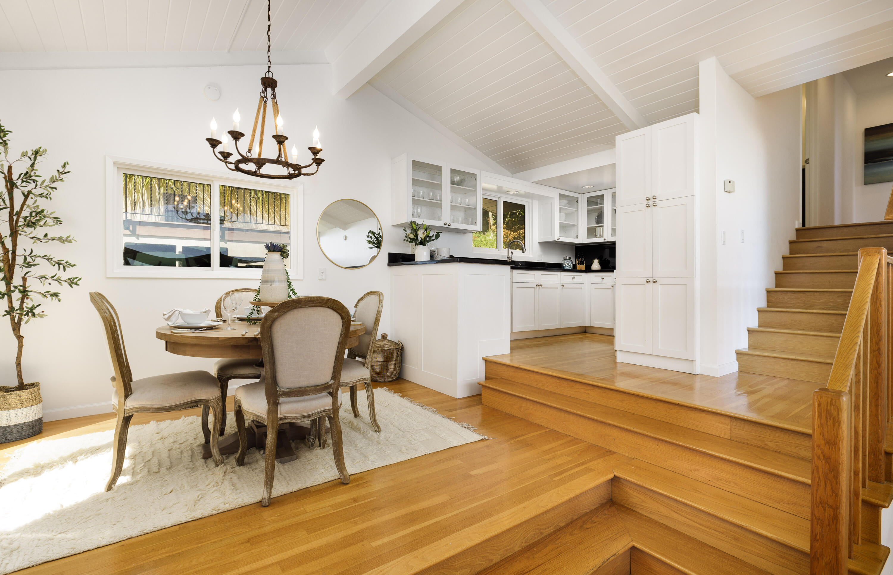 425 Fellowship Road Santa Barbara, CA 93109 - Photo 5 of 20 a view of a dining room with furniture and wooden floor