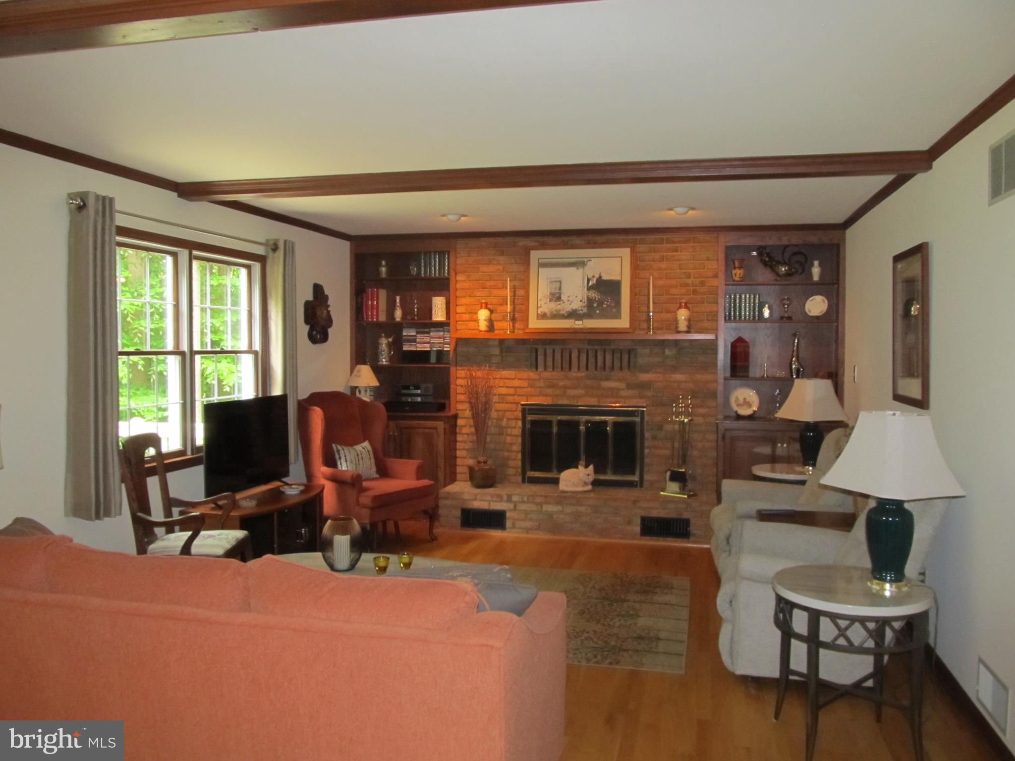 5 Ridgecliff Court Kingsville, MD 21087 - Photo 24 of 43 Family Room off kitchen features brick fireplace