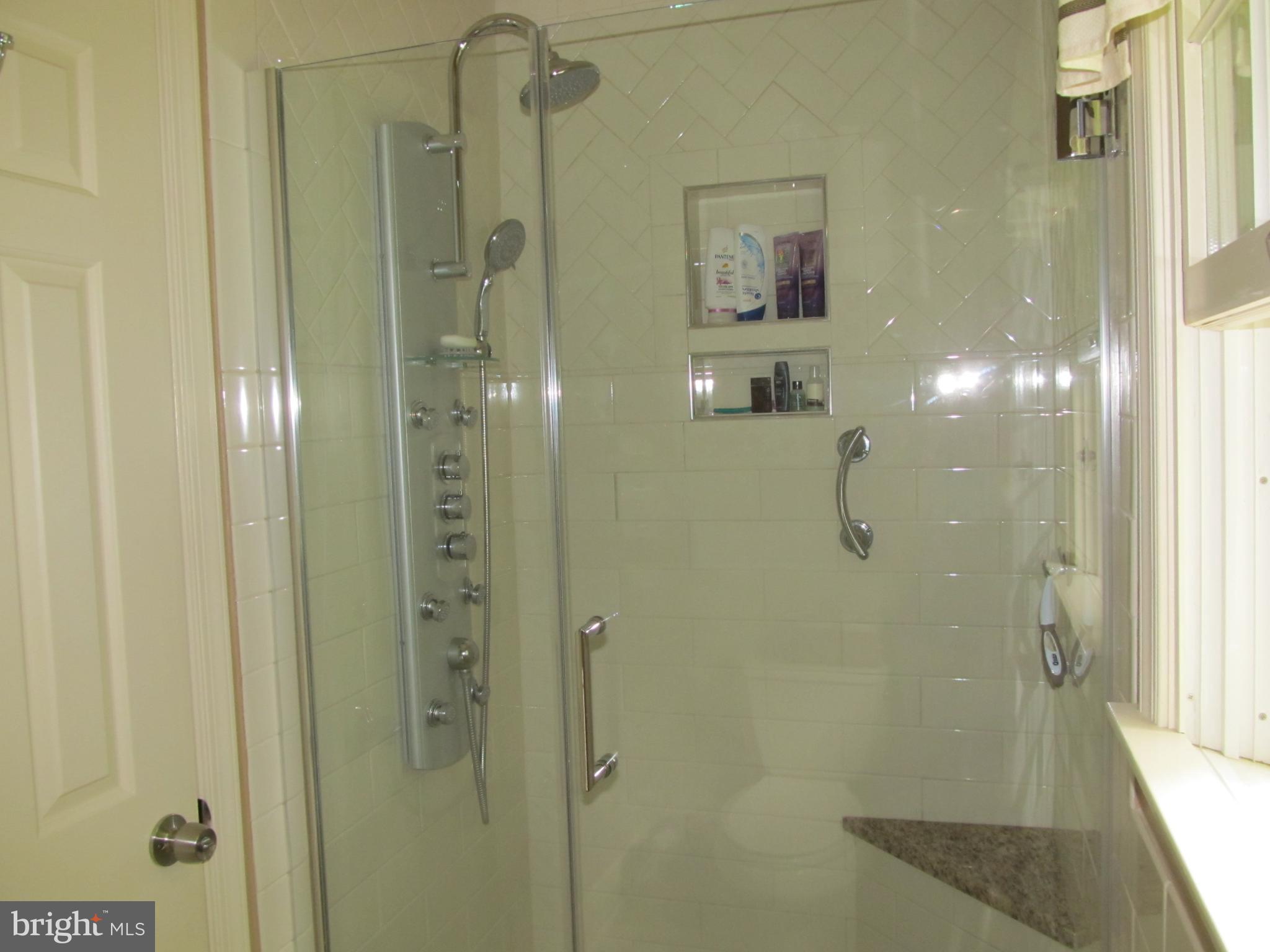 5 Ridgecliff Court Kingsville, MD 21087 - Photo 32 of 43 Primary Bath has tile shower with seat
