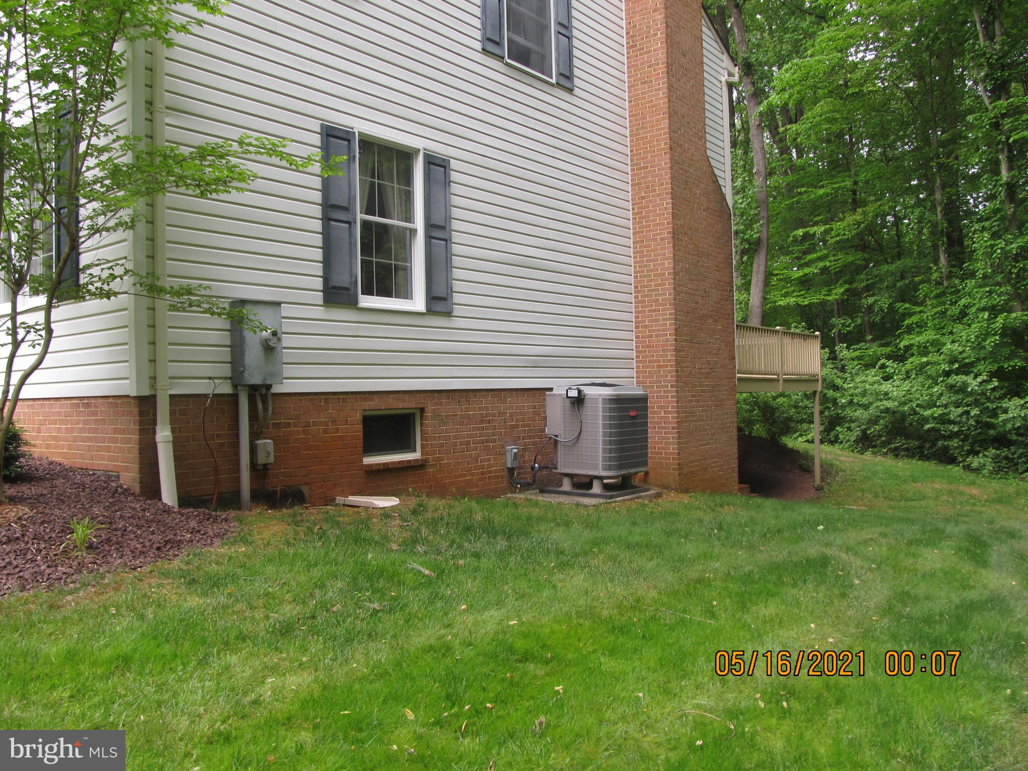 5 Ridgecliff Court Kingsville, MD 21087 - Photo 10 of 43 Side of house shows brick foundation