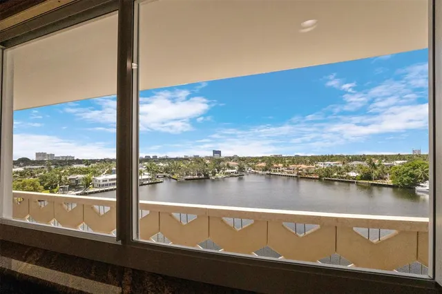 a view of a chairs and table in patio