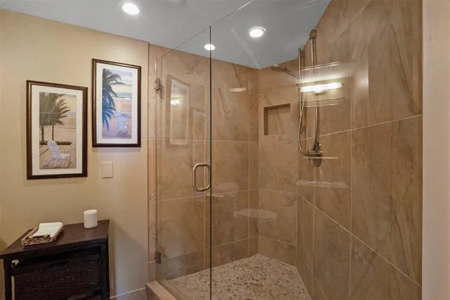 an aerial view of residential houses with outdoor space and river