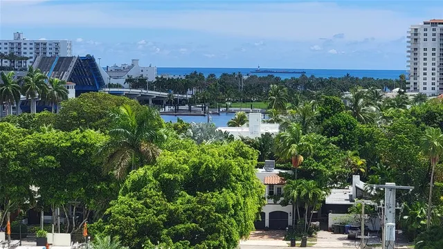 a living room with furniture rug and a window
