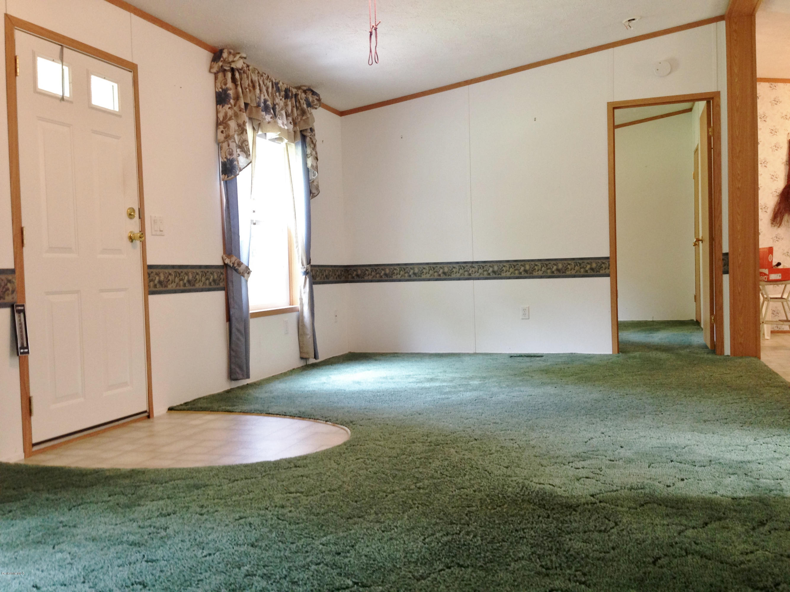 576 East Otis Road Otis, MA 01253 - Photo 11 of 13 a view of a big room with closet and windows