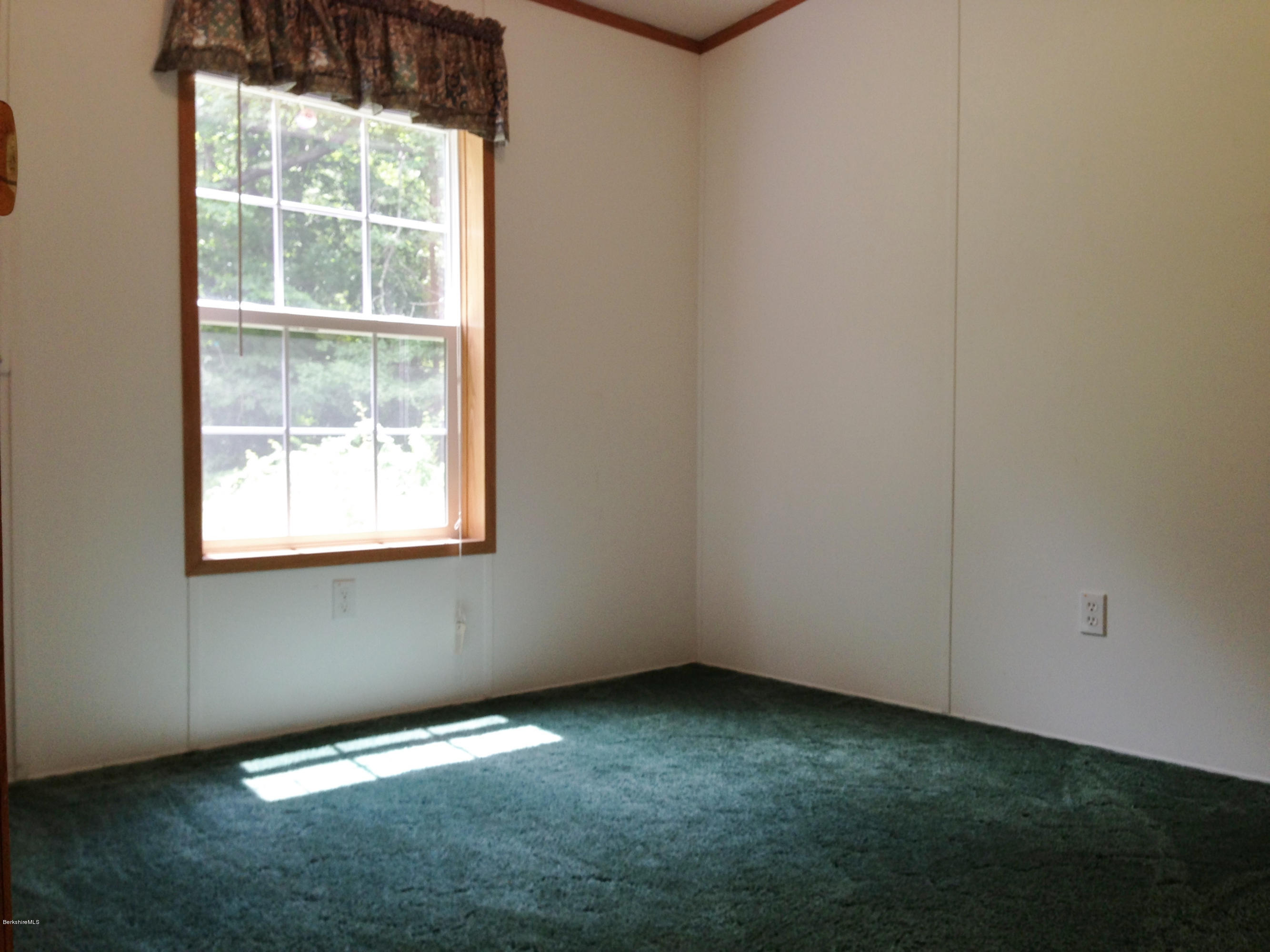 576 East Otis Road Otis, MA 01253 - Photo 12 of 13 a view of an empty room with a window