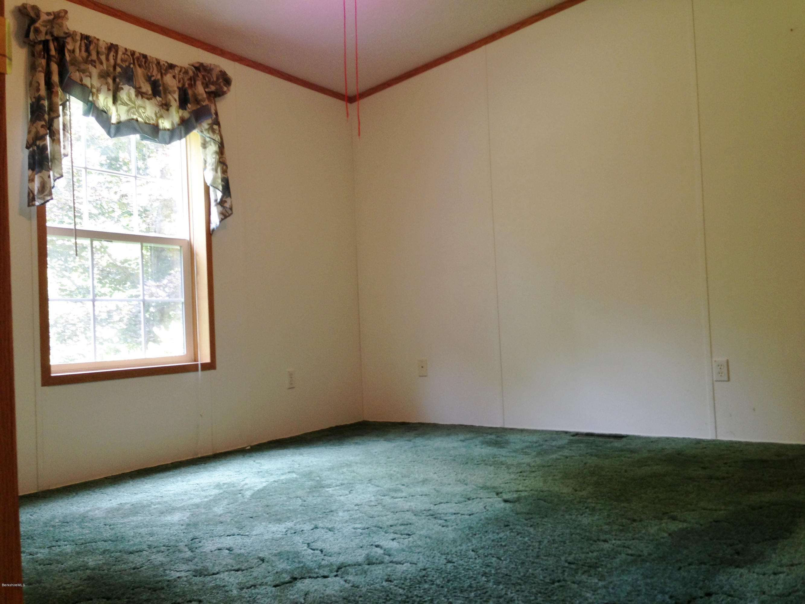576 East Otis Road Otis, MA 01253 - Photo 13 of 13 a view of a room that has a window in it