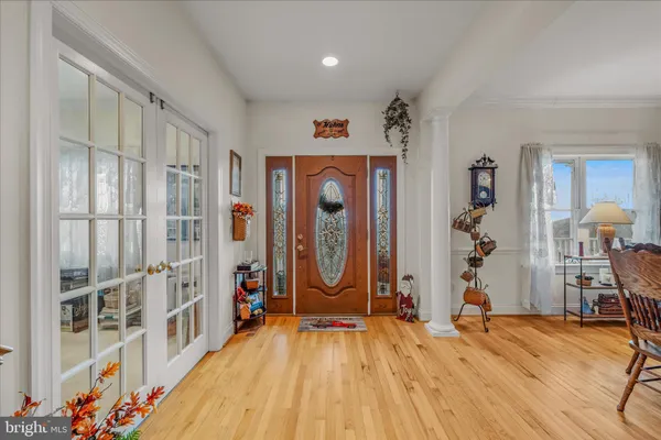 a work room with furniture and book shelf