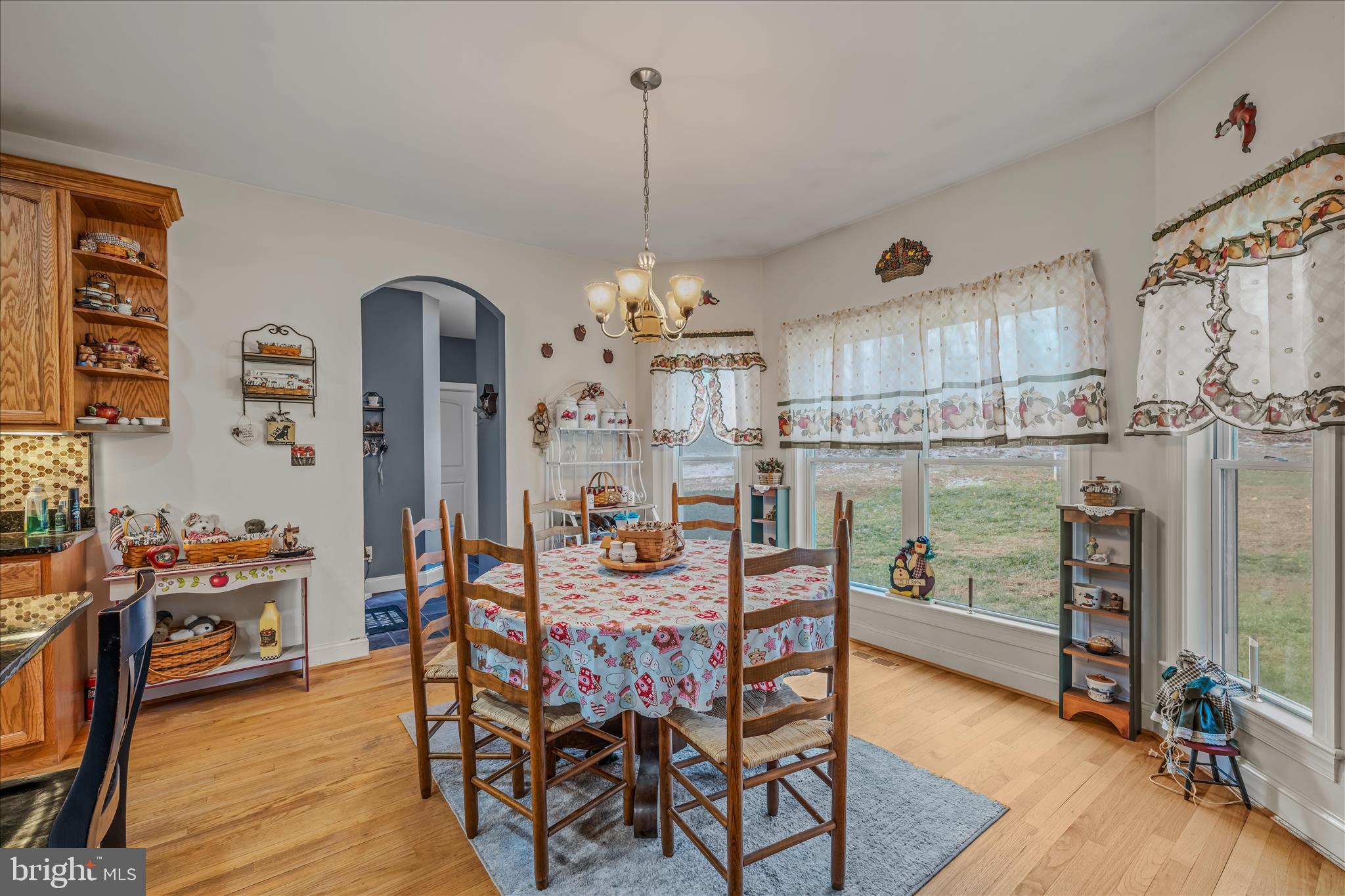 7020 Debold Road Thurmont, MD 21788 - Photo 26 of 83 a dining room with furniture and wooden floor