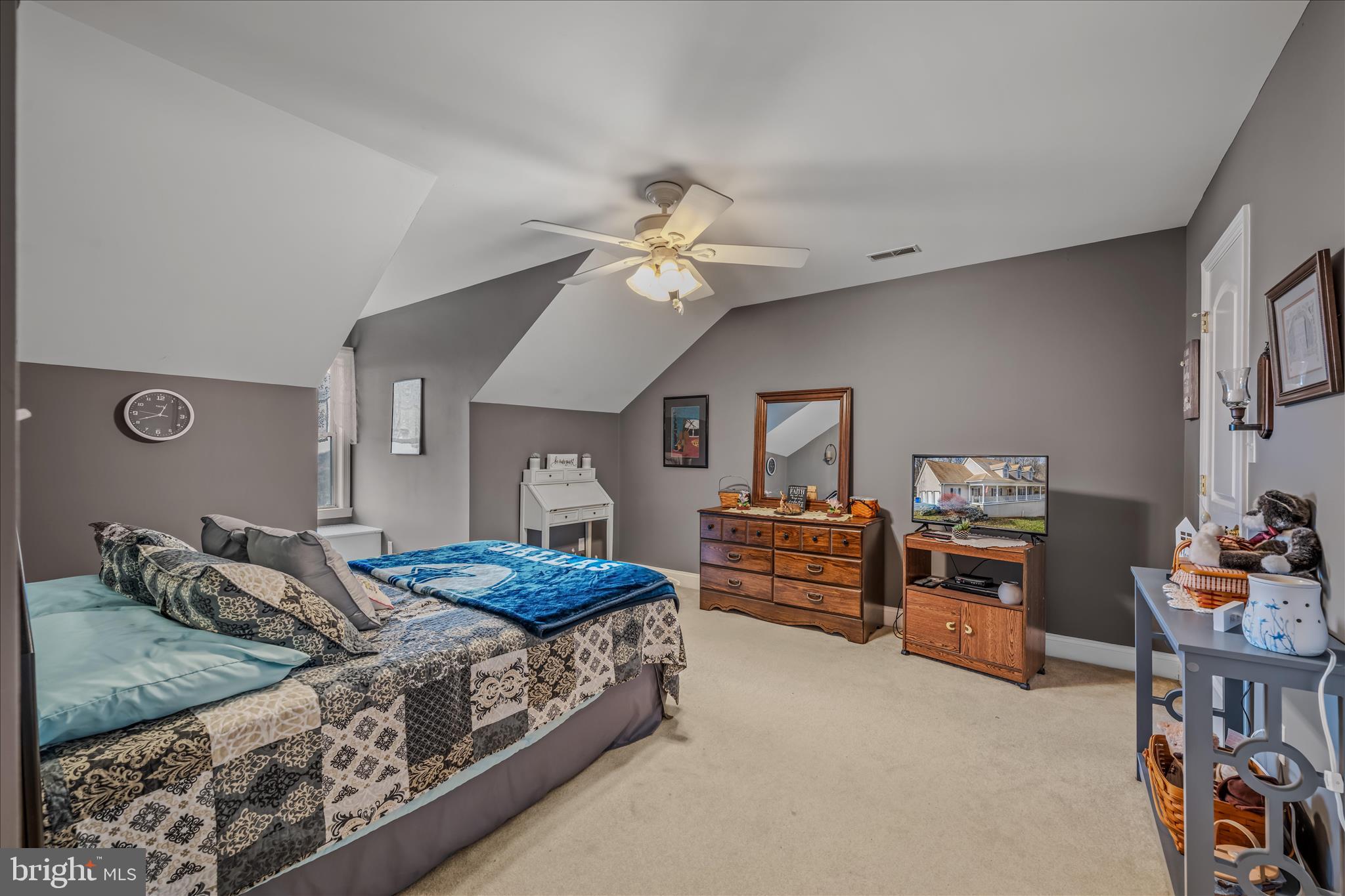 7020 Debold Road Thurmont, MD 21788 - Photo 48 of 83 a bedroom with furniture and a chandelier